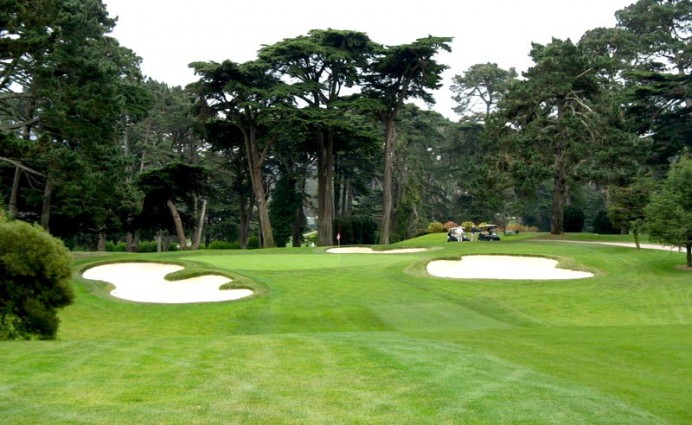 The approach to the small, sloping green of the par four sixth.