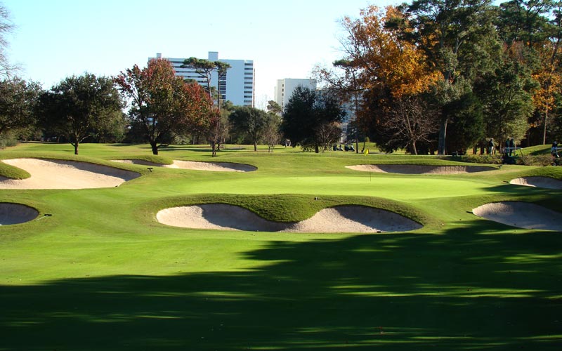 Rung with bunkers, the two tiered sixteen green calls for a precise approach.