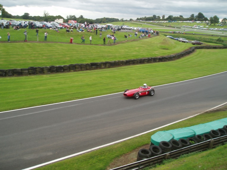 A Maserati 250F taking part in historic motor racing at Oulton Park, Cheshire.