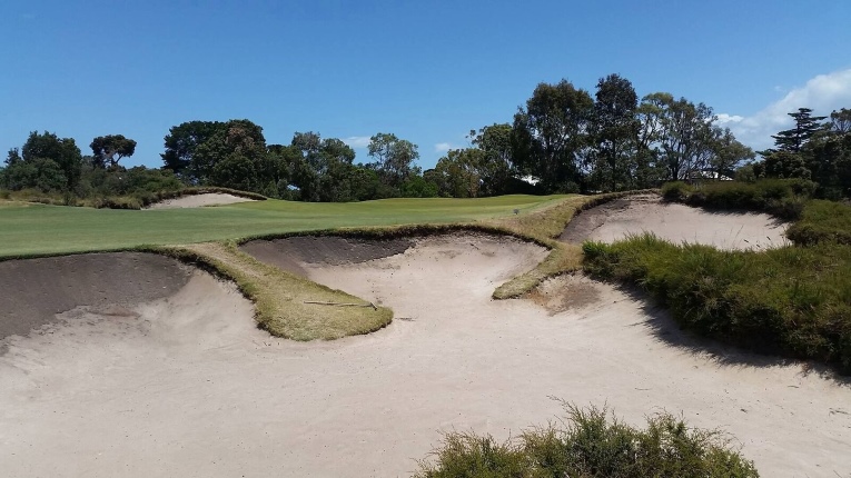 Approach shots that fail to reach the putting surface are often shunted right into this famous bunker.
