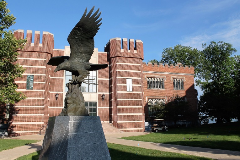 No half measures on the campus of Culver. In the background is the Culver Legion Memorial building for those alumni that gave their life in World War I and in the foreground is the Centennial Eagle given by a Texas alumnus in 1994. How could such a place countenance a diminished golf course? Answer: It couldn't. 