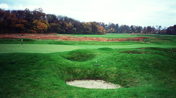 Traviss recently restored small mounds and bunkers make a recovery shot quite difficult on the 14th at Garden City.