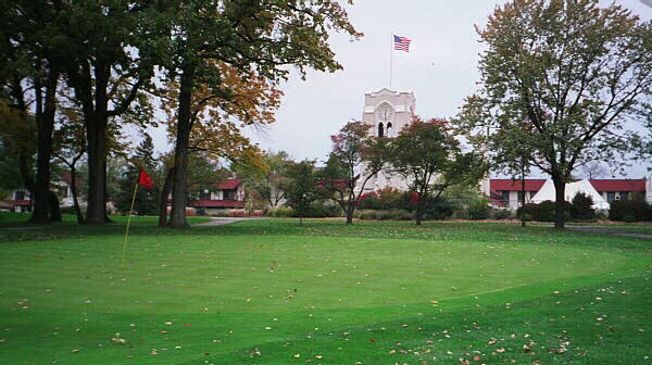 Many of the Tom Bendelows most interesting greens on the South Course are extensions of the fairway. Olympia Fields world famous clubhouse looms in the background.