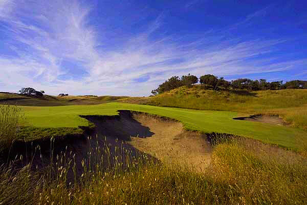 The seventeenth hole playing 468 metres, is prime example of the beautiful bunkers and green complexes found on the Gunnamatta course.