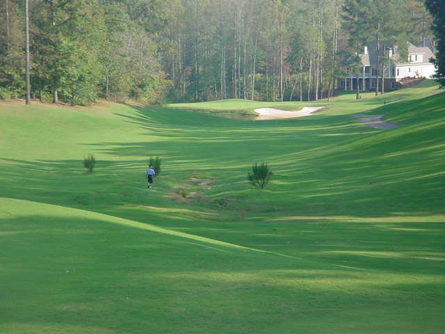 Notice how the hills on either side of the 3 hole kick the balls toward the fairway.