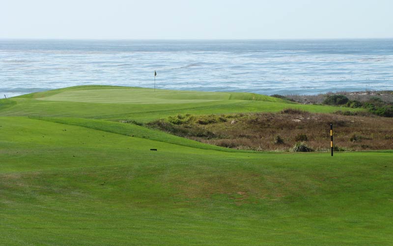 Though the environmentally sensitive areas undermine some of the fun, Spanish Bay is full of classic architectural features like this horizon green that calls for a nervy pitch at the first.