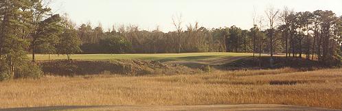 The tee shot across the tidal marsh on the fifteenth hole at Riverfront