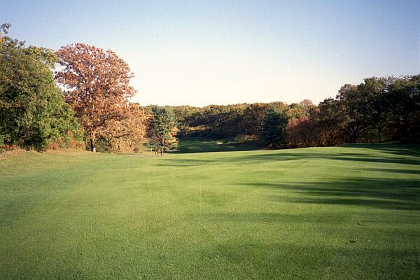The green on the 16th is to the left of the bunker in the distance ¦ try keeping a ball in the middle of this fairway.