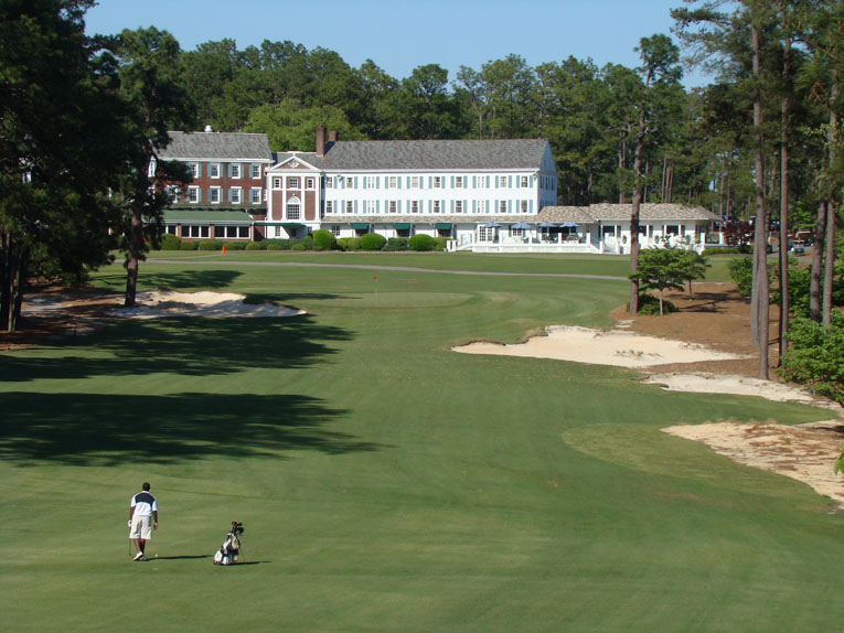 ... as one rounds the bend on this slight dogleft left, bringing the Mid Pines Hotel more into view.