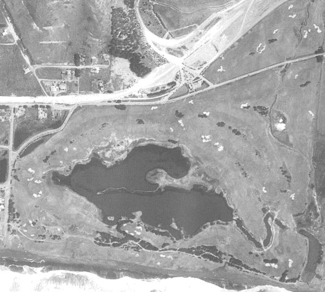 This 1941 aerial photo shows that the urban legend of the course washing away shortly after it opened, is a myth. The picture shows the original course almost fully intact prior to the creation of four new holes inland, on the other side of a state highway.