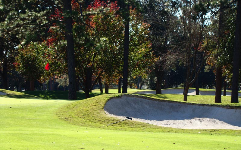 The built up bunker walls obscure targets such as the fourteenth green and make them play all the smaller.
