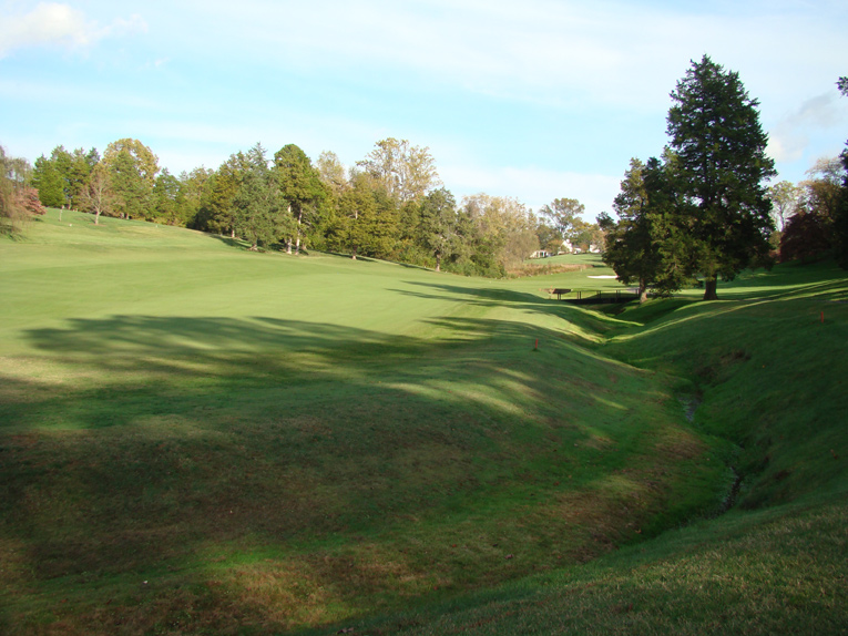 Just as it was advantageous on the last hole to hug the creek, so it also is at the fifth whose fairway bends to the right past this ditch. This is the number one handicap hole and those who steer too far left are unlikely to reach the green in regulation.
