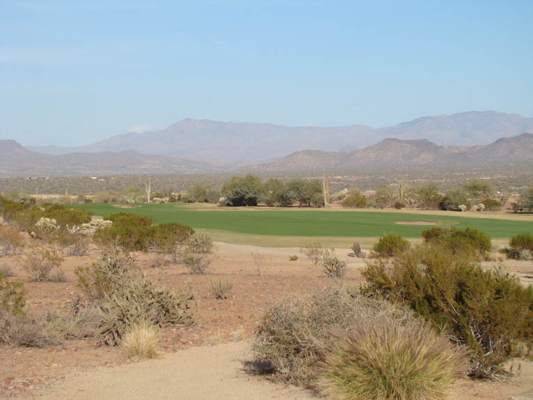 Look left and right at the desert floor and you gain an appreciation of how Coore & Crenshaw placed the fairway at grade to the desert floor.