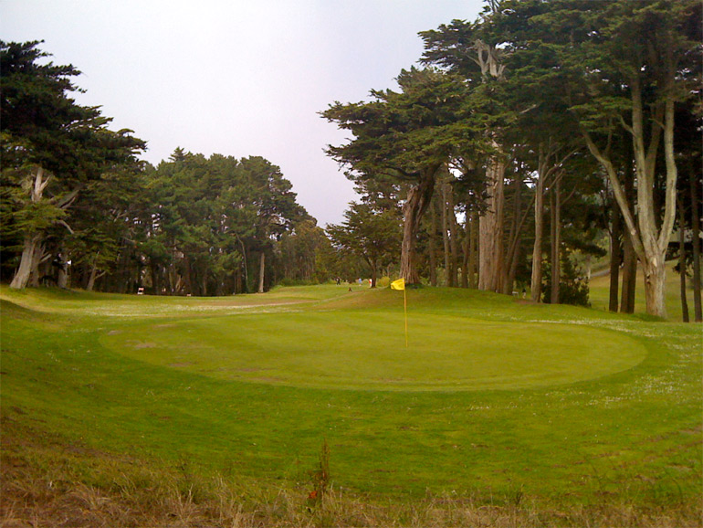 From behind the 3rd green, it's apparent that trees nearly block a straight shot to the green.