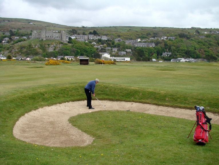 Old, established courses have a way of featuring unusual hazards. This imaginative bunker fifty yards short of the twelfth green is one such example at Harlech.