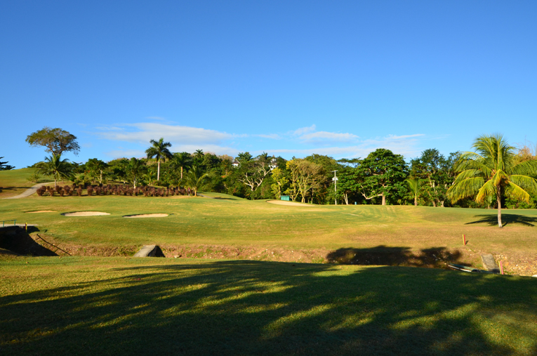 Plummer gracefully created a plateau atop a bed of coral for the 8th green, just over a creek bed. Note the perfect color of the fairway: overwatered, soft fairways are absent in Jamaica.