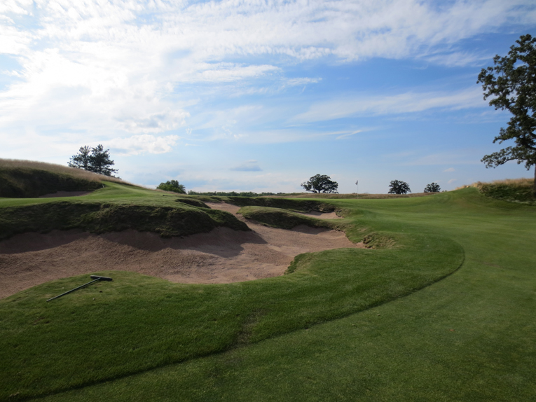 The serpentine bunker fronting the fourth green follows the natural contours while providing some tough front left hole locations.