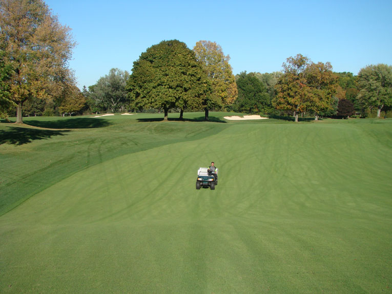 Looking back down the twelfth fairway, McMaster’s cart denotes where the rough line was in 2002. This wonderful bowl is an example of a unique feature that once was lost and is now found. 