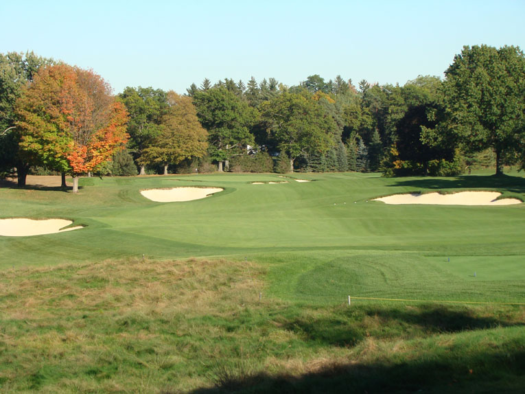 Look how artistically the bunkers are cut into land down the fourteenth fairway. This picture in 2002 would have shown just four bunkers, all greatly reduced in size, and the hole exhibited little of the charm that it does today.