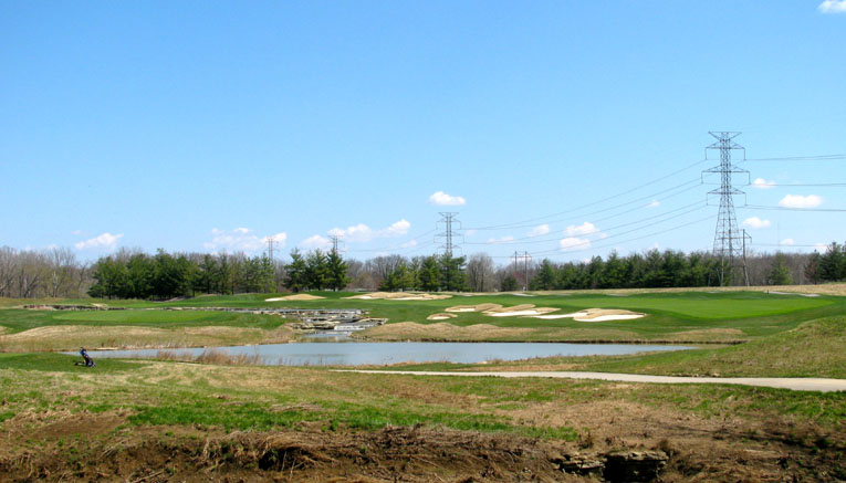 View of the seventh hole from the back tee. Note the alternate fairway left and the green to the far left of the photograph