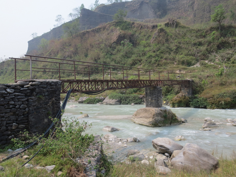 This bridge is one example why the author recommends hiking boots rather than golf shoes for a round at Himalayan Golf Course.