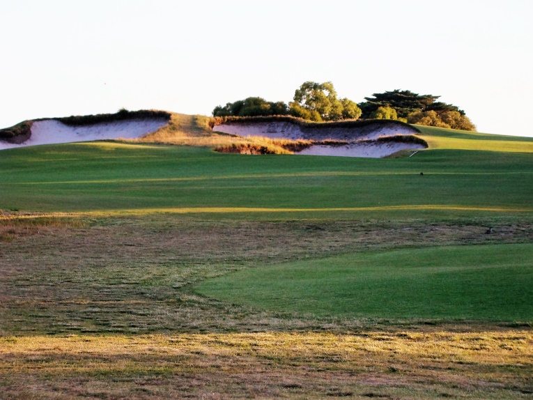 The bunkers cut into the crest of the hill lend flair and a sense of drama to the uphill tee ball. 