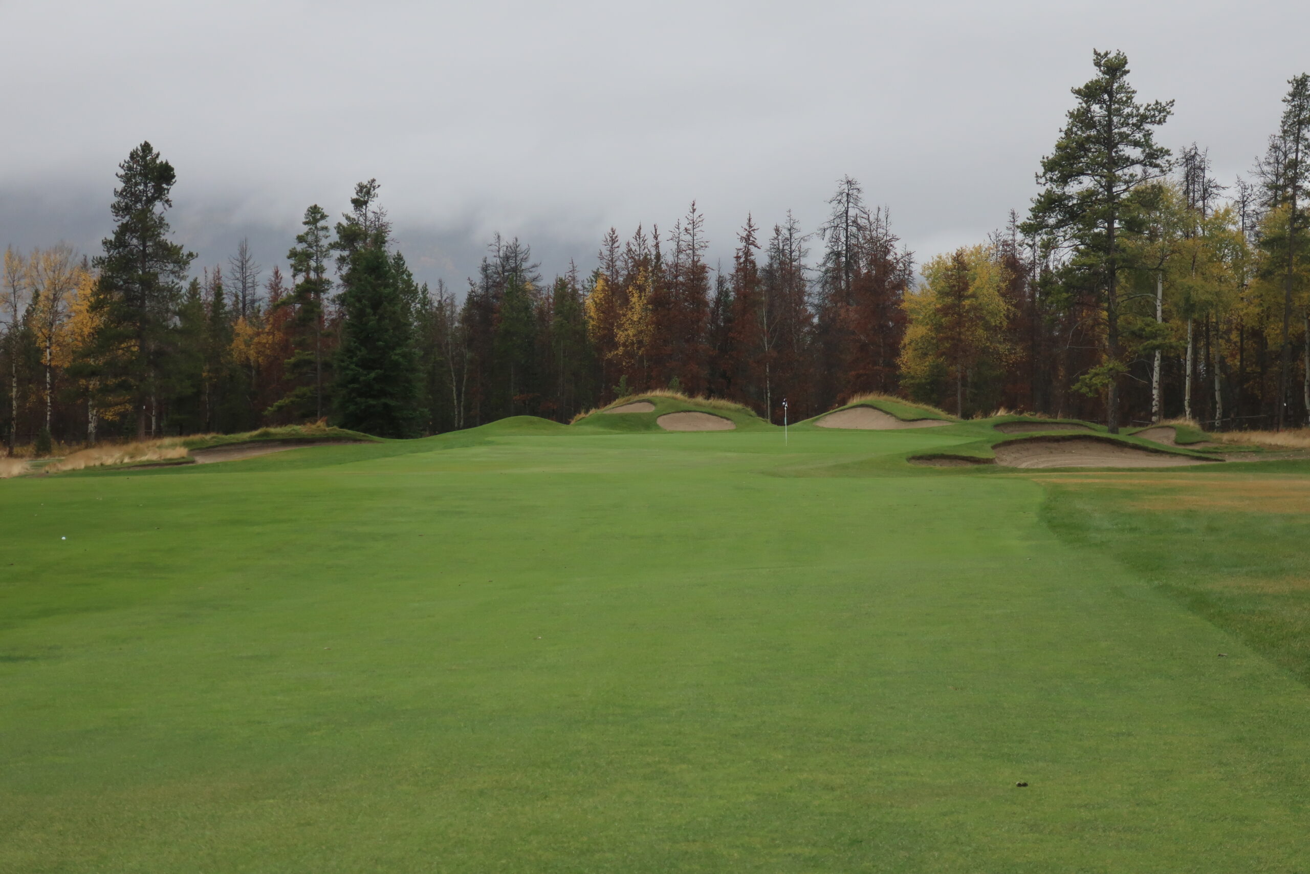 Slightly different angles of the 5th, but more dramatic bunkering in the 50s (around the green) than current